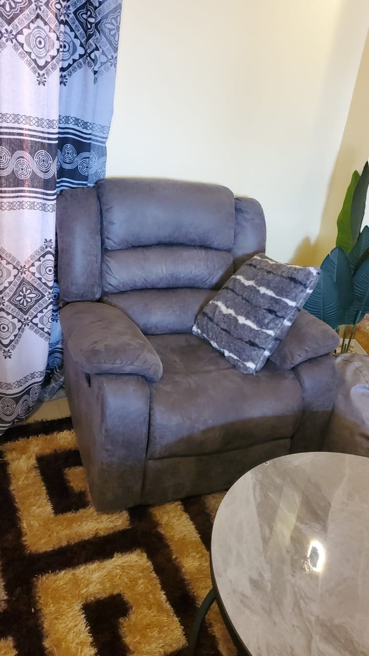 USED FAIRELY GREY 6-SEATER RECLINERS