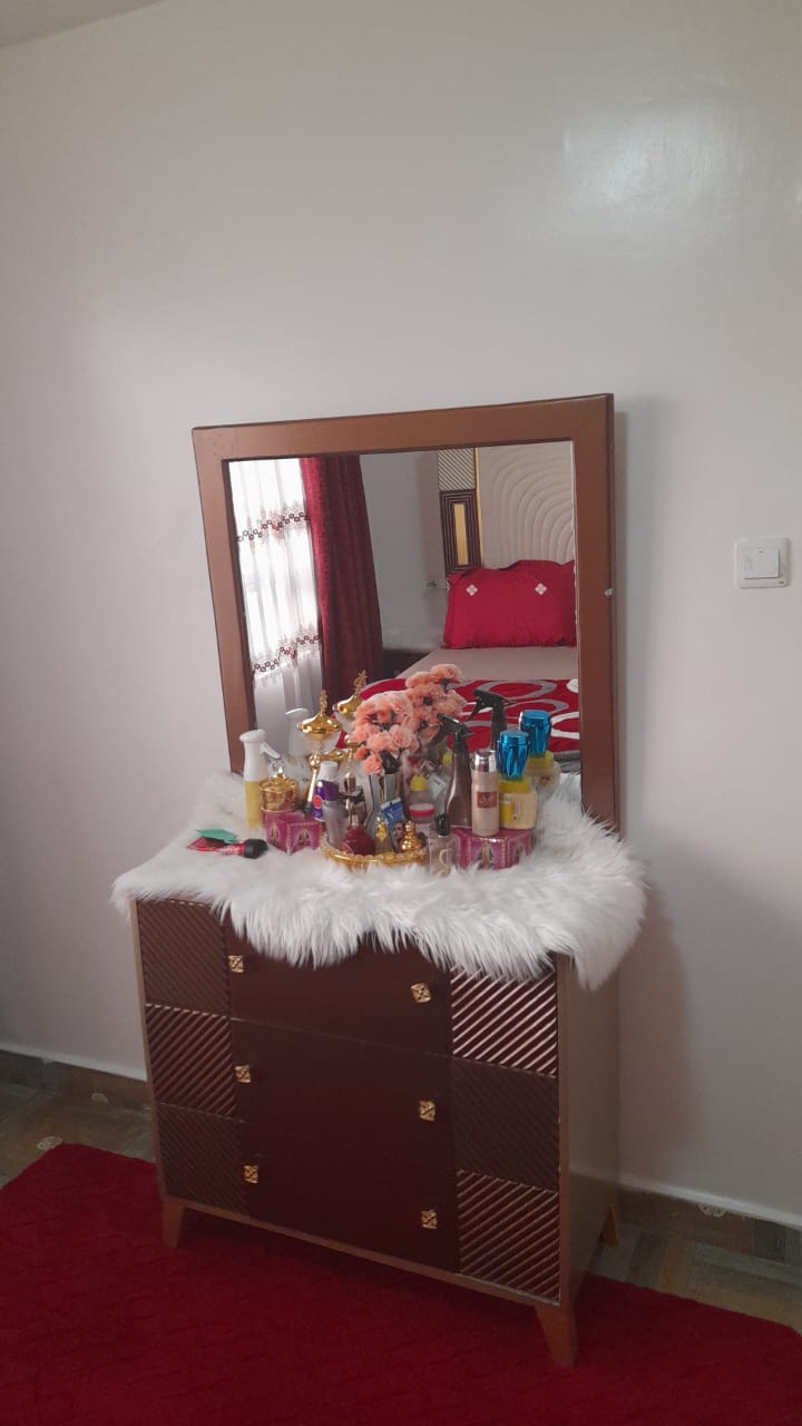 SMALL BROWN DRESSING TABLE 