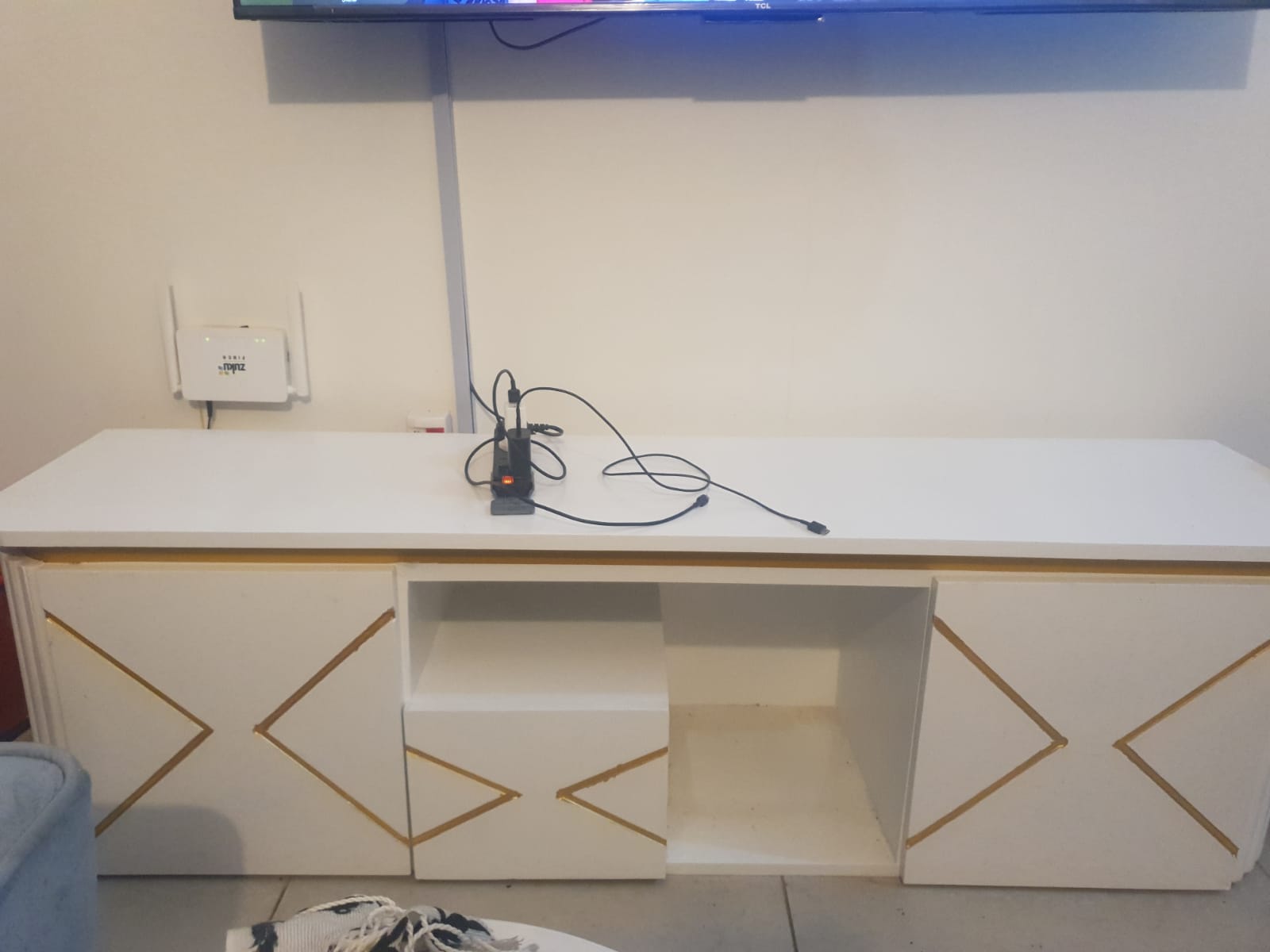 Elegant White and Gold TV Stand