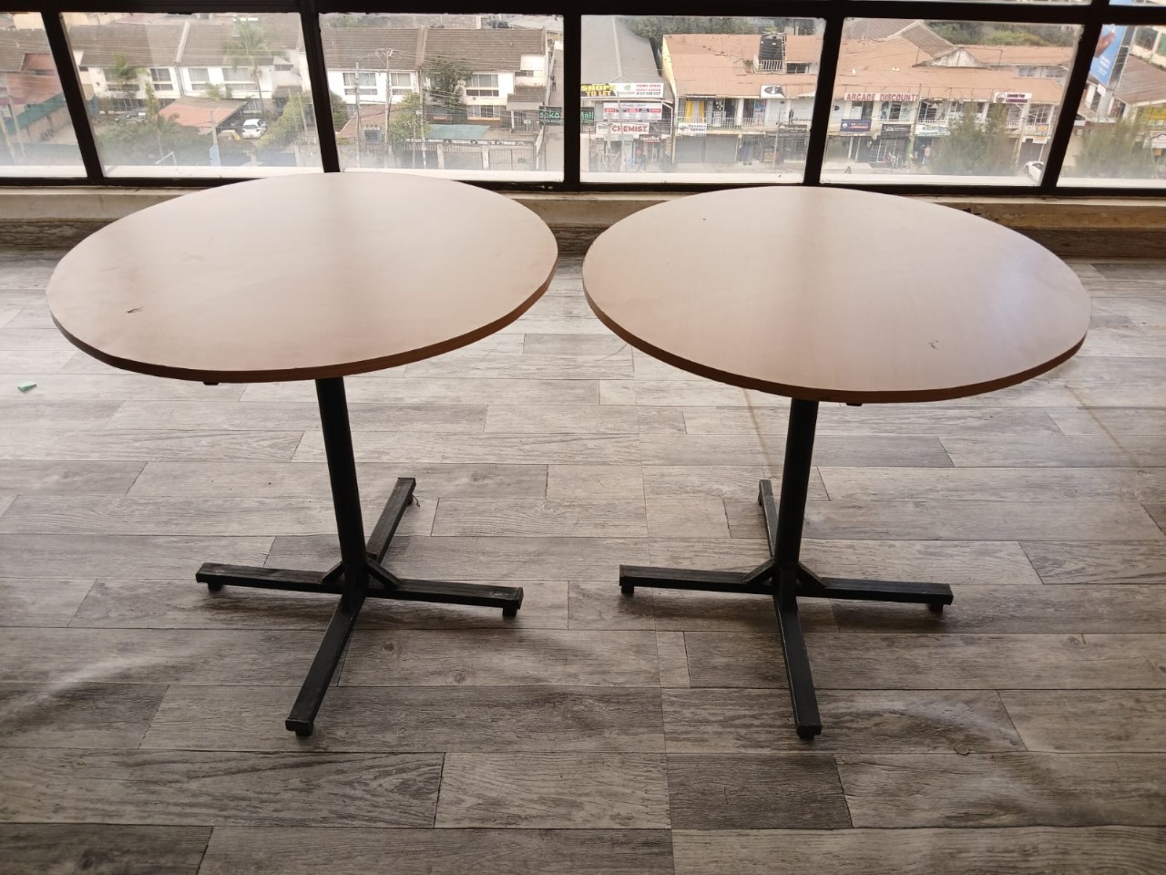 2 Sturdy Circular Outdoor Tables