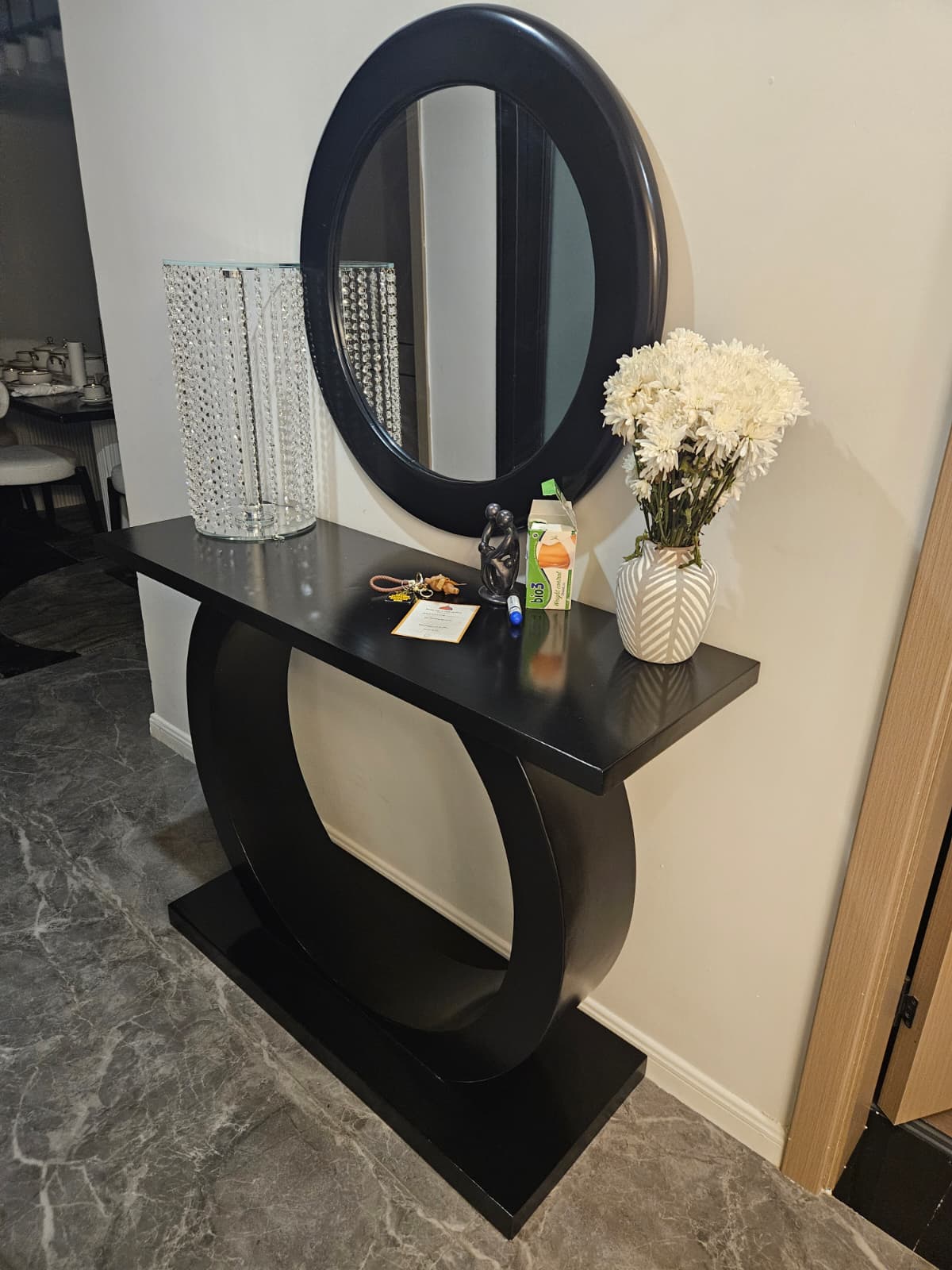 Elegant Black Dressing Console With Oval Mirror
