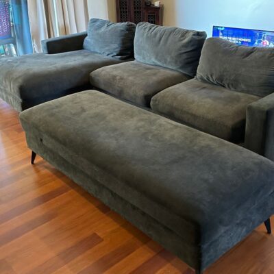 Grey L shape sofa with sofabed