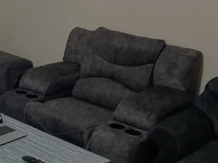 Clean 2 one-seater grey recliner chairs