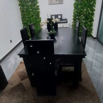 An Elegant black 6 seater dining set