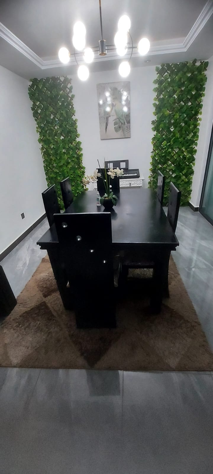 An Elegant black 6 seater dining set