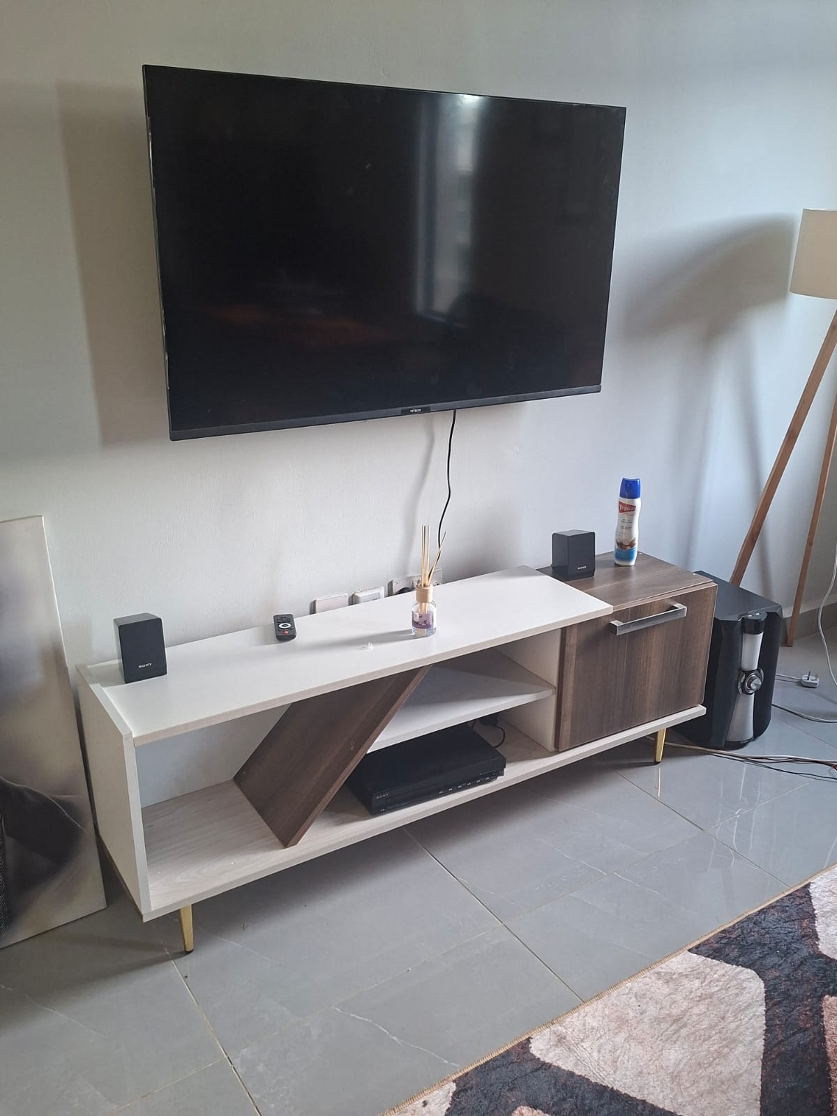 White and Brown TV stand available