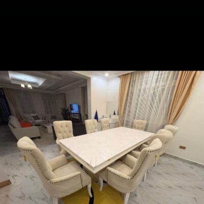 Clean 8-Seater White Marble Top Dining Table