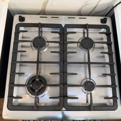 Clean 4-Burner Haier Cooker + Electric Oven