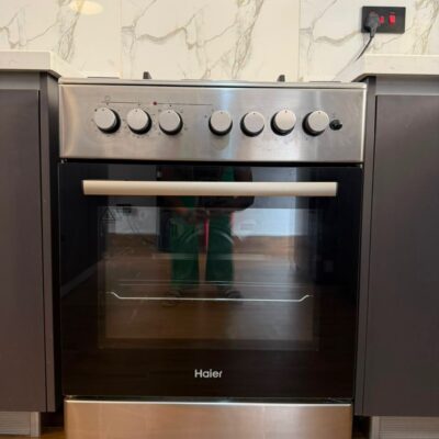 Clean 4-Burner Haier Cooker + Electric Oven