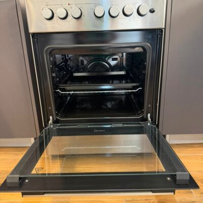 Clean 4-Burner Haier Cooker + Electric Oven