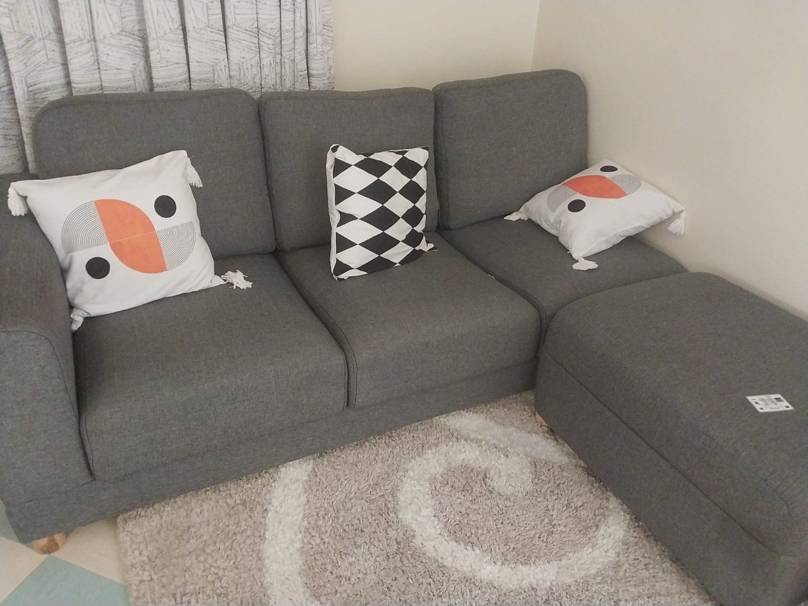 Comfortable Grey 3-Seater Sofa with Pouf