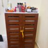 Brown Slatted Wooden Shoe Cabinet – Entryway or Bedroom Storage.