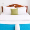 Rustic Timber Double Bed – Warm Reddish-Brown Finish with Colorful Accents