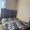 Modern Wingback Bed with Geometric Bedding